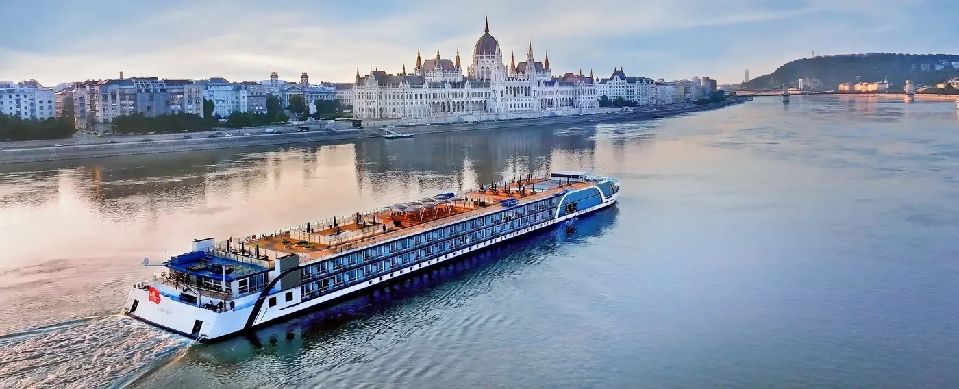 AmaWaterways river cruise ship sailing the Danube past the Hungarian Parliament Building in Budapest